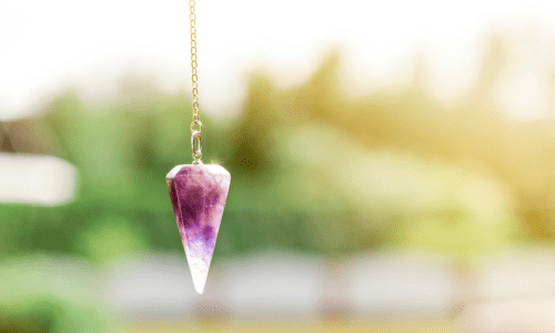 A diamond shaped purple color neckless