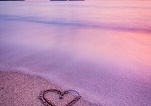 A traced heart on sand